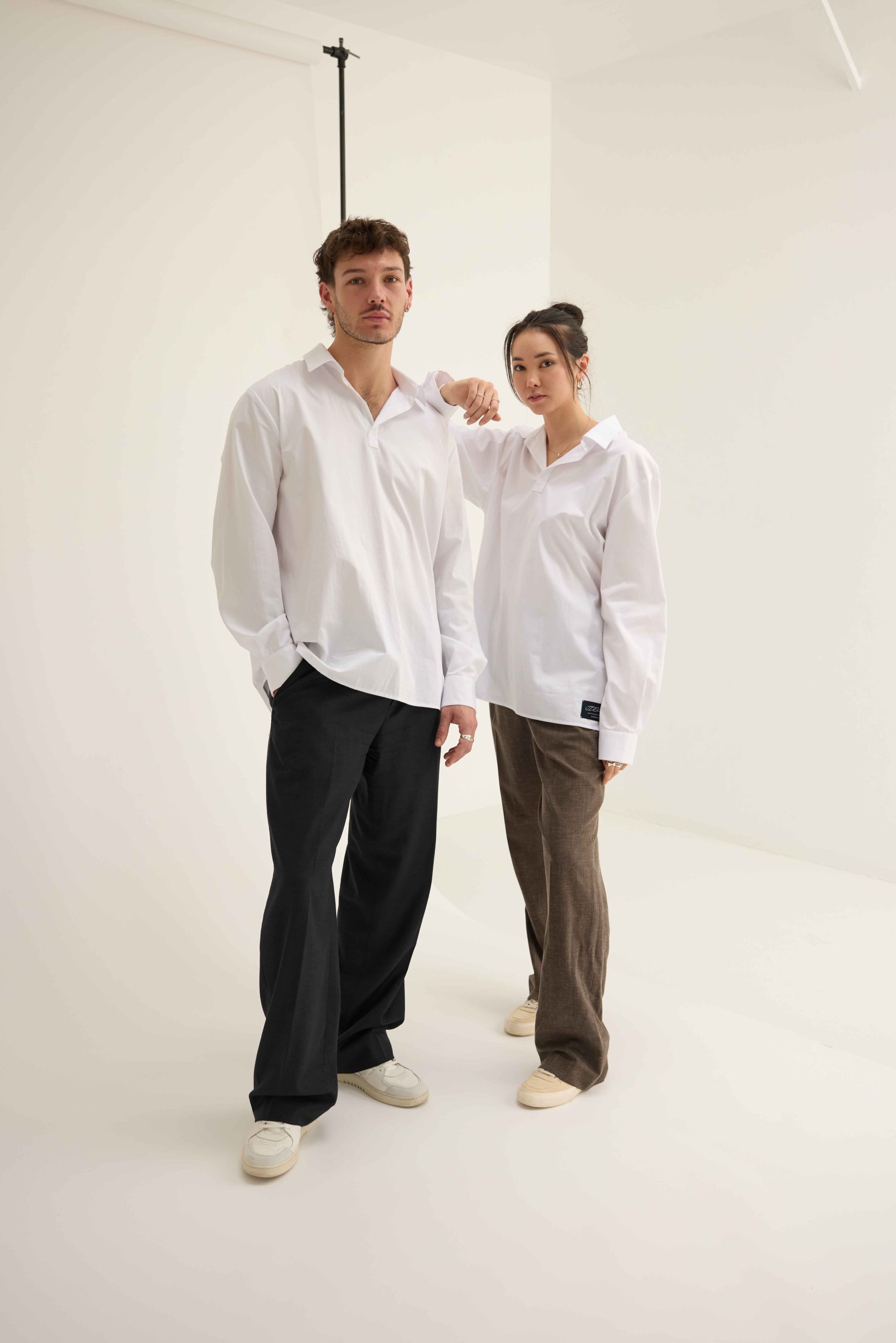 Couple wearing JD Cashen timeless men's fashion pieces